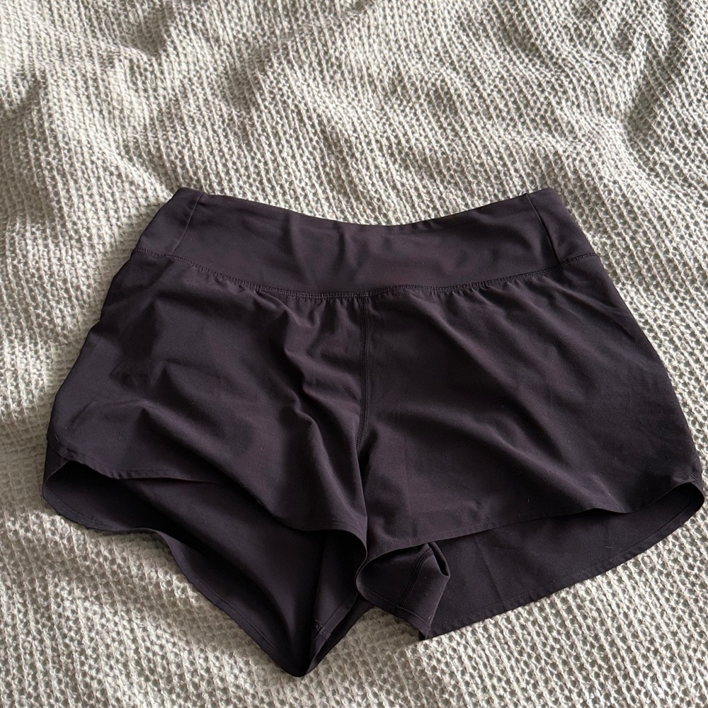 Women’s black Lululemon speedup high rise shorts.